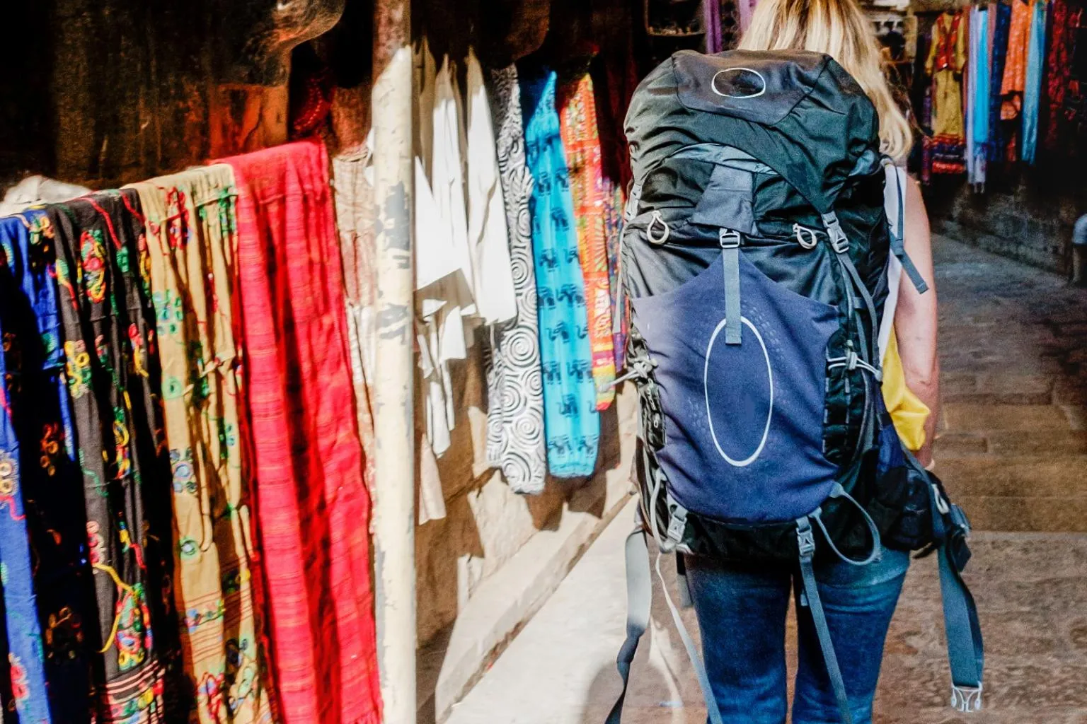 western traveler exploring indian local market street culture